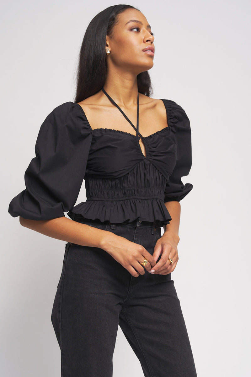 Bailey 44  Shani Peplum Top in Black left 3/4 view