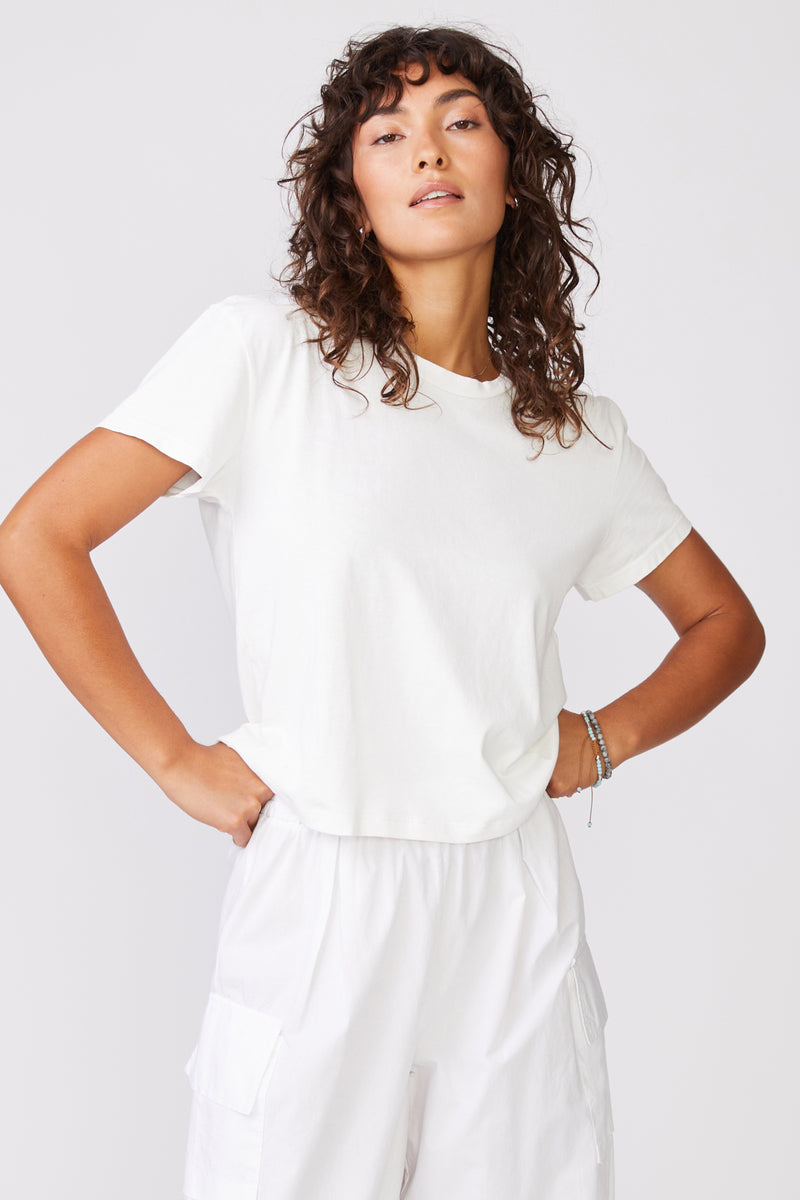 Stateside Cloud Jersey Short Sleeve Crew in White-3/4 model has her hands by her side 