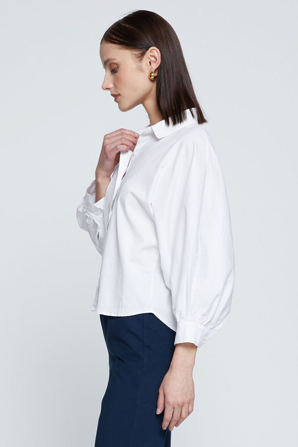 Stateside Sandman Poplin Dolman Puff Sleeve Shirt-side view model is holding her collar