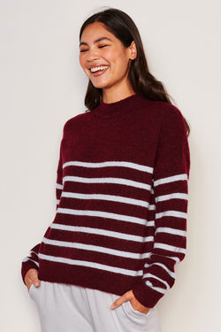 Sundry Stripes Mock Neck Cozy Sweater in Bordeaux-model is laughing and has her hands in her pocket 