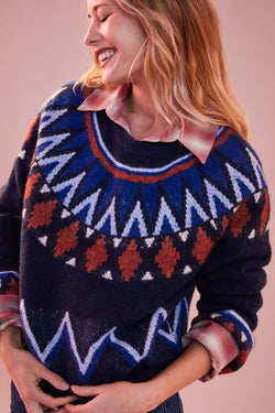 Sundry Fairisle Crew Neck Sweater in Deep Navy-campaign image model is looking to the side and there is a pink background 