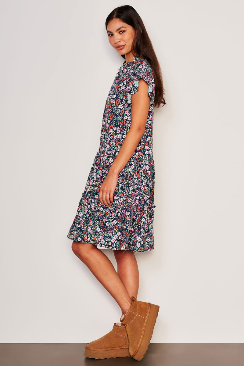 Sundry Mini Field Dress in Deep Navy-side view full model is bending her knee wearing low cut boots