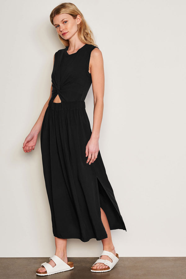 Sundry Midi Mixed Media Dress in Black-model is walking to the side