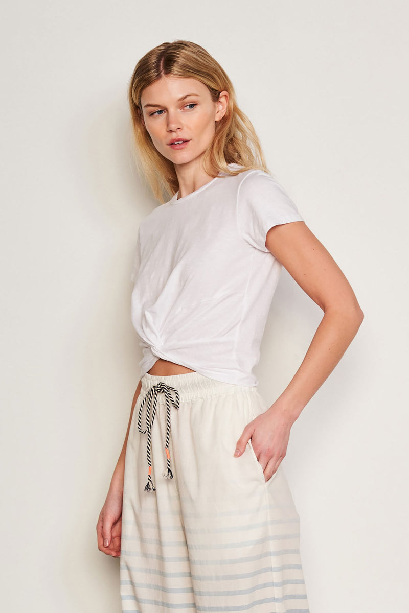 Sundry Twist Tee in Optic White-side view model has her hand on her hip 