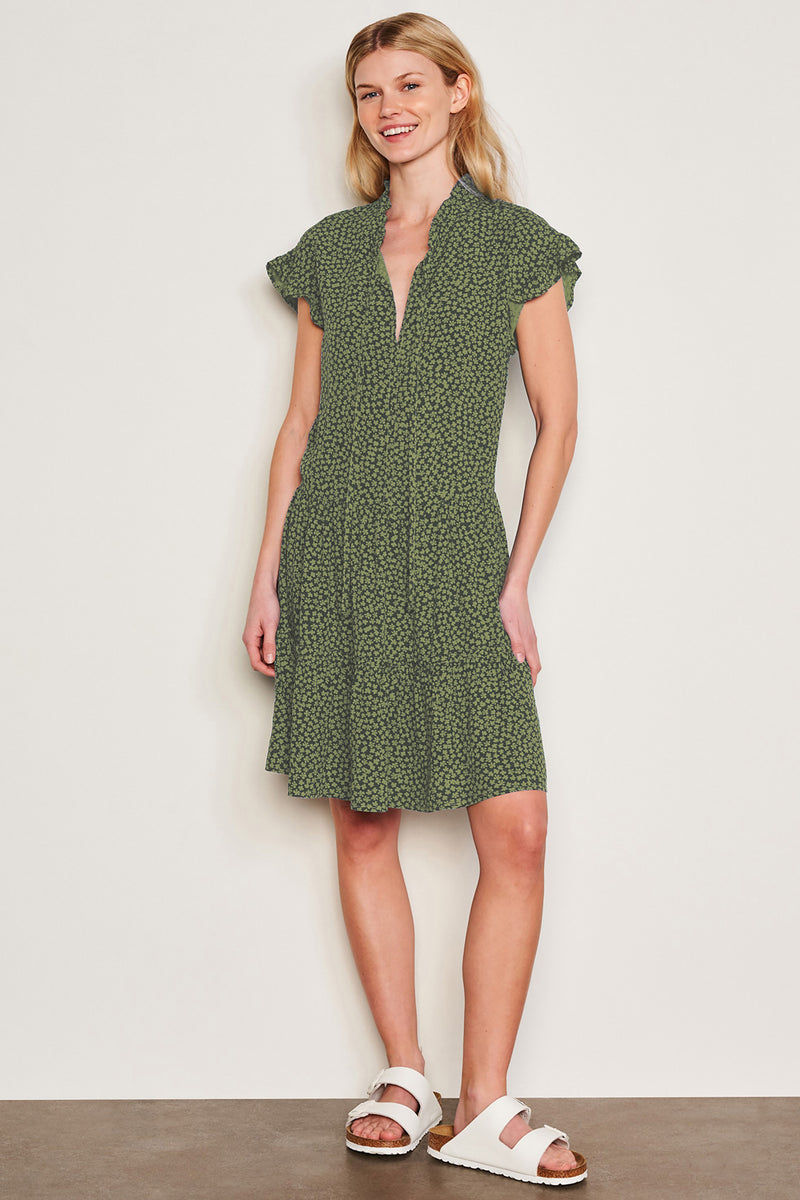 Sundry Clover Short Femme Dress in Olive in front view with the blonde model putting her hands to her sides