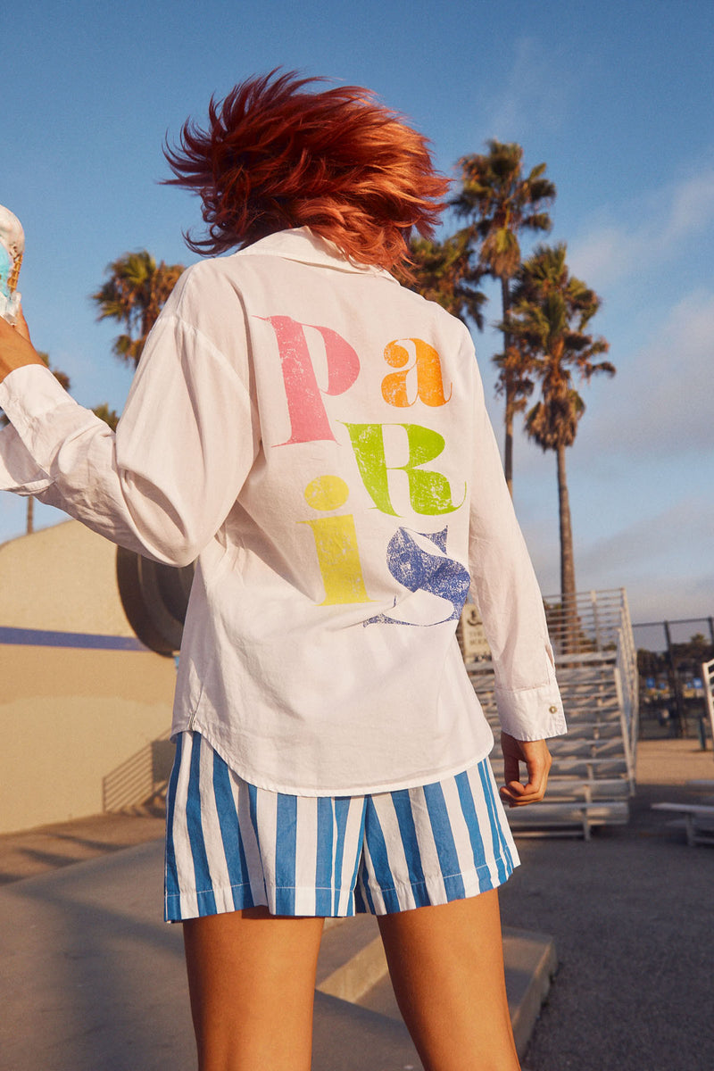 Sundry Paris Long Sleeve Button Down in White-model is at a skate park and verbiage 