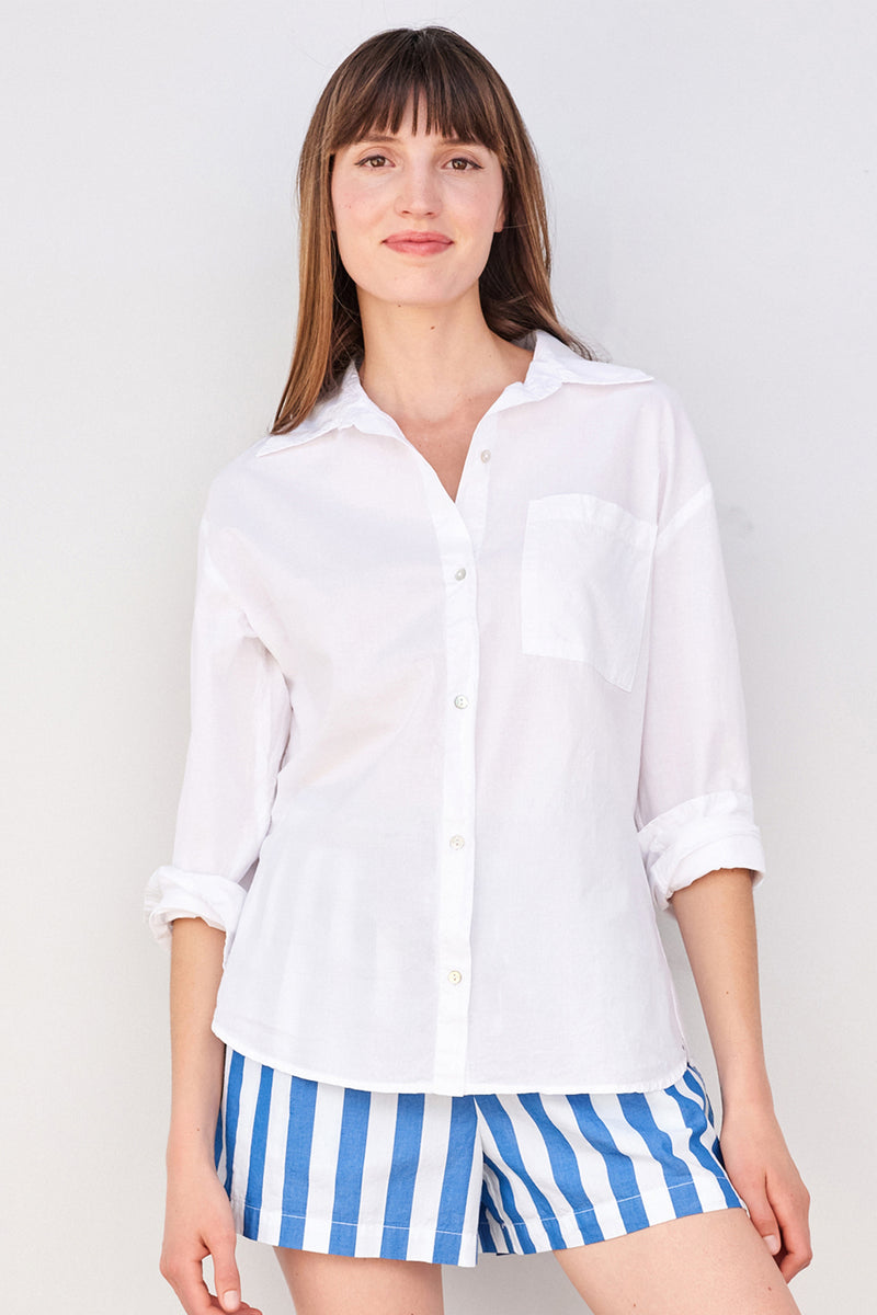 Sundry Paris Long Sleeve Button Down in White-model is looking forward 